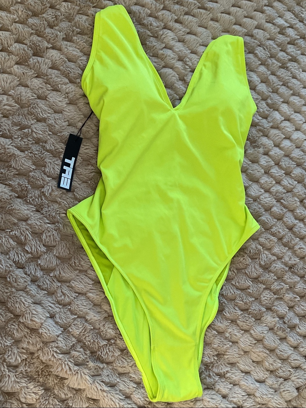 TA3 Swim Neon Acid Swimsuit Hi Cut PLUNGEY v5
XL REG/ LONG NWT/returns Note:pict